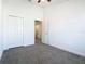 Bright bedroom with ceiling fan and a large closet at 3196 Crown Jewel Ct, Winter Park, FL 32792