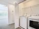 Bright laundry room with Samsung washer and dryer at 3196 Crown Jewel Ct, Winter Park, FL 32792