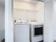 Convenient laundry room with washer and dryer at 3196 Crown Jewel Ct, Winter Park, FL 32792