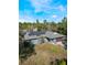 Single-story home with solar panels and a large backyard at 3290 Red Fox Dr, Deltona, FL 32725