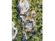 Aerial view of house with solar panels, pool, and detached garage at 3290 Red Fox Dr, Deltona, FL 32725