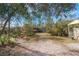 Landscaped backyard with gazebo and shed at 3290 Red Fox Dr, Deltona, FL 32725