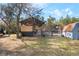 Rustic barn with horse shelter and fenced area at 3290 Red Fox Dr, Deltona, FL 32725