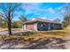 Attached garage with additional storage space at 3290 Red Fox Dr, Deltona, FL 32725