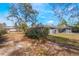 Ranch style home with a large yard and mature trees at 3290 Red Fox Dr, Deltona, FL 32725