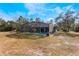 Ranch style home with a screened pool and backyard at 3290 Red Fox Dr, Deltona, FL 32725