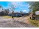 Ranch-style home with a large backyard and attached garage at 3290 Red Fox Dr, Deltona, FL 32725