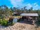 Property with various outbuildings, including a barn and shed at 3290 Red Fox Dr, Deltona, FL 32725