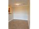 Separate dining area with tile floors and wainscoting at 3700 Castle Pines Ln # 4032, Orlando, FL 32839