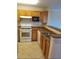 Modern kitchen with ample cabinetry and tile flooring at 3700 Castle Pines Ln # 4032, Orlando, FL 32839