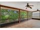 Relaxing screened porch overlooking a lush backyard with wood flooring at 409 San Sebastian Prado, Altamonte Springs, FL 32714