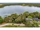 Aerial view of property and surrounding lake at 41235 Silver Dr, Umatilla, FL 32784