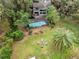 Aerial view showing home, pool, and backyard at 41235 Silver Dr, Umatilla, FL 32784