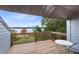 Deck overlooking lake with table and chairs at 41235 Silver Dr, Umatilla, FL 32784