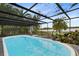 Enjoy this refreshing pool with lake views at 41235 Silver Dr, Umatilla, FL 32784