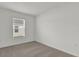 Bedroom featuring a window bringing in natural light and carpeted flooring at 5571 Creek Haven Way, Lakeland, FL 33810