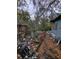 Backyard of fixer-upper home with debris and needs significant cleanup at 620 Cochran Rd, Geneva, FL 32732