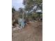 Overgrown lot with debris and shed at 620 Cochran Rd, Geneva, FL 32732