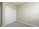 Bedroom with double door closet and neutral walls at 627 Bayhawk St, Debary, FL 32713