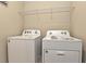 Laundry room with side by side washer and dryer at 627 Bayhawk St, Debary, FL 32713