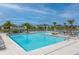 Resort-style community pool with ample lounge chairs at 627 Bayhawk St, Debary, FL 32713