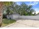 Detached garage with driveway and fenced backyard at 680 Avenue N Se, Winter Haven, FL 33880