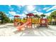 playground with slides and climbing structures at 7619 Oakmoss Sw Loop, Davenport, FL 33837