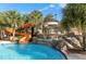 Waterpark with slides and a waterfall at 7619 Oakmoss Sw Loop, Davenport, FL 33837