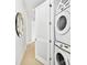 Convenient laundry room with stackable washer and dryer at 7740 Sandy Ridge Dr # 111, Reunion, FL 34747