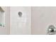 Clean shower with bright white tiles and modern fixtures at 7740 Sandy Ridge Dr # 111, Reunion, FL 34747