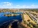 Aerial view of lake and surrounding landscape at 8547 Bayview Crossing Dr, Winter Garden, FL 34787