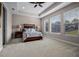 Spacious bedroom with a comfortable bed and plenty of natural light at 8547 Bayview Crossing Dr, Winter Garden, FL 34787