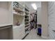 Large walk-in closet with ample shelving and hanging space at 8547 Bayview Crossing Dr, Winter Garden, FL 34787