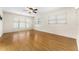 Bright bedroom with hardwood floors and ceiling fan at 1012 N Ferncreek Ave, Orlando, FL 32803