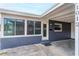 House exterior showcasing gray paint, carport, and a front entrance at 1012 N Ferncreek Ave, Orlando, FL 32803