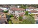 Two-story house with tile roof, double garage, and lush landscaping at 10389 Henbury St, Orlando, FL 32832