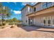 Backyard patio with fire pit and brick pavers at 10389 Henbury St, Orlando, FL 32832