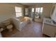 Bathroom with a bathtub, shower, and double vanity at 10810 Dearden Cir, Orlando, FL 32817