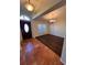 Formal dining room with dark wood flooring and a chandelier at 10810 Dearden Cir, Orlando, FL 32817