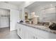 Elegant bathroom boasting dual vanity and granite counters at 1264 Big Bass Dr, Ormond Beach, FL 32174