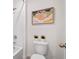 Bathroom featuring a toilet, bathtub, and artistic wall decor at 1264 Big Bass Dr, Ormond Beach, FL 32174