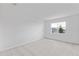Bright bedroom with carpet and a large window for natural light at 1343 Foran Manor Rd, Haines City, FL 33844