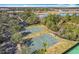 Two basketball courts and a view of a lake at 13651 Eridanus Dr, Orlando, FL 32828