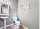 Clean bathroom with pedestal sink and toilet at 13651 Eridanus Dr, Orlando, FL 32828