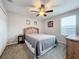 Bright bedroom with ceiling fan and large window at 13651 Eridanus Dr, Orlando, FL 32828