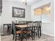 Elegant dining room with wood flooring and large window at 13651 Eridanus Dr, Orlando, FL 32828