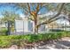 Community racquetball court with landscaping at 13651 Eridanus Dr, Orlando, FL 32828