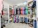 Large walk-in closet with ample shelving and hanging space at 13651 Eridanus Dr, Orlando, FL 32828