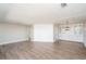 Open dining area with wood flooring and white accent wall at 1401 W Highway 50 # 68, Clermont, FL 34711