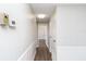 Clean and bright hallway with wood-look floors and neutral walls at 1401 W Highway 50 # 68, Clermont, FL 34711